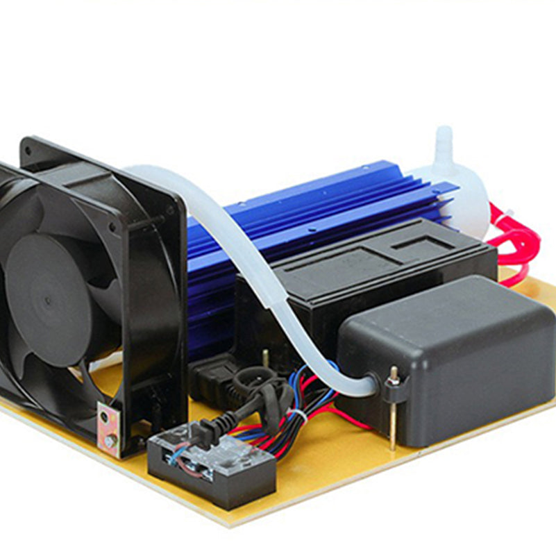 Angled perspective view of KINYO-CHINA KYOG-10GC ozone generator module showcasing the blue air-cooled discharge tube, black 100W electronic driver pack, red silicone connection leads, and barbed air inlet nozzle.