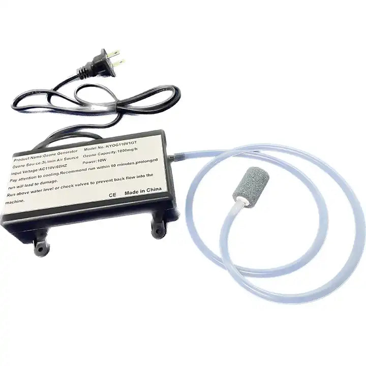 Complete product kit studio photograph of KINYO-CHINA KYOG-1GT ozone generator system featuring the black power module with 110V plug connected to coiled translucent food-grade silicone aeration tubing and cylindrical mineral diffuser bubble stone for water and air sterilization.