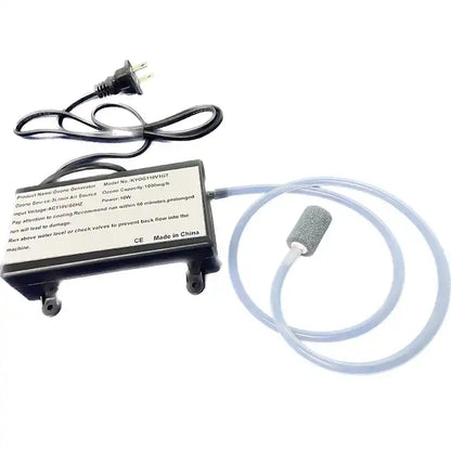 Complete product kit studio photograph of KINYO-CHINA KYOG-1GT ozone generator system featuring the black power module with 110V plug connected to coiled translucent food-grade silicone aeration tubing and cylindrical mineral diffuser bubble stone for water and air sterilization.
