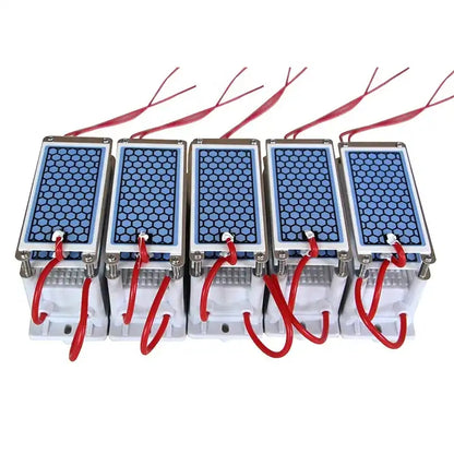    Factory production line display featuring a row of five assembled KYOG220V10GP ceramic plate ozone generator modules on a white background, illustrating high-capacity OEM manufacturing, standardized honeycomb ceramic elements, and red high-voltage wiring.
   