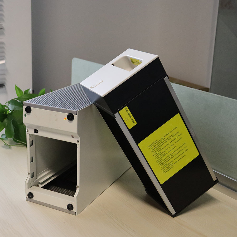 Heavy-duty metal air purifier housing and detached washable ESP collector cell of KY-APS-220M resting side-by-side on meeting room table, highlighting the durable metallic chassis and detailed English maintenance instructions for zero-consumable filtration.