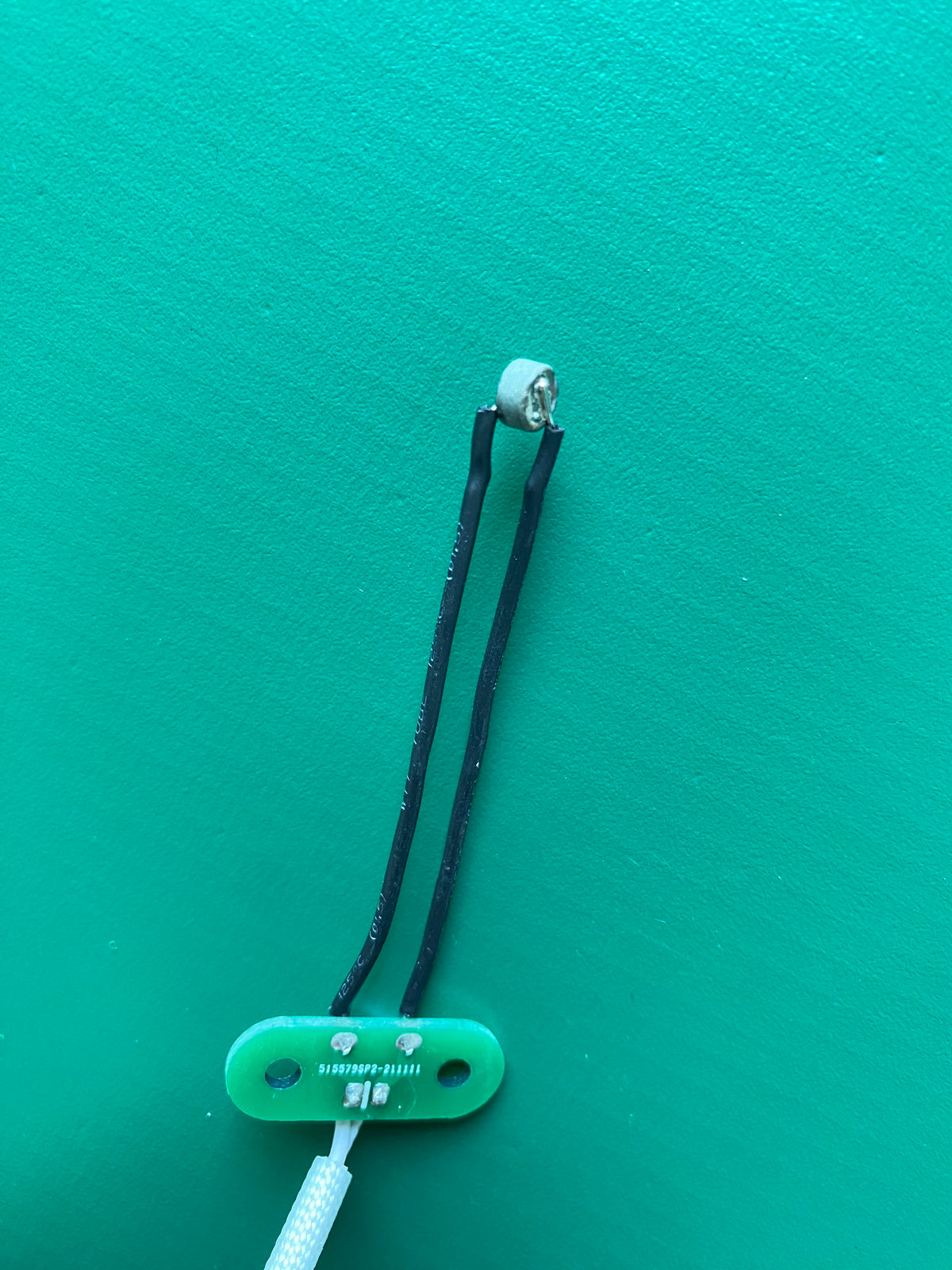 Macro Detail of Thermal Airflow Sensing Probe Head with Flanged Mounting Plate and Insulated Lead Wires KY265AFS12V