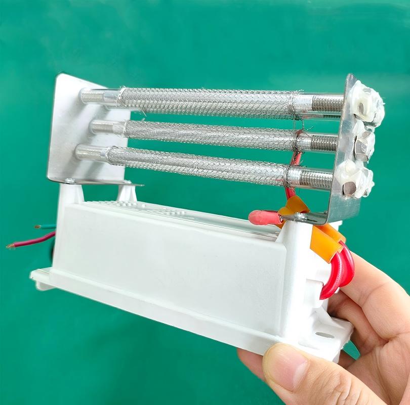 Side perspective studio product view of KINYO-CHINA KYOG220V15G 15g/h ozone generator held against a green background showing five quartz dielectric tubes secured with stainless steel end brackets, high-voltage insulated red wiring harness, and compact white chassis operating at 220VAC 55W for commercial dishwashers, dryers, and cold storage facilities.