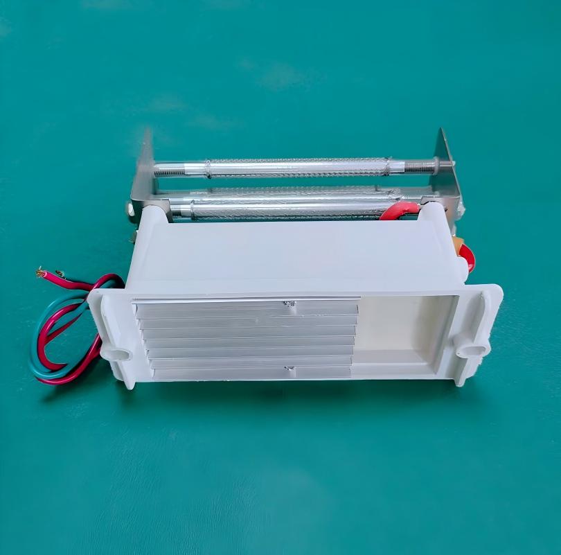 Top-down angled studio photograph of KINYO-CHINA KYOG220V15G 15g/h ozone generator tube assembly held by hand on a green backdrop highlighting the five precision-spaced quartz mesh tubes, stainless steel threaded tie rods, and high-voltage corona discharge electrodes operating at 3.1kV to 3.5kV high frequency for industrial air and water ozonation.
