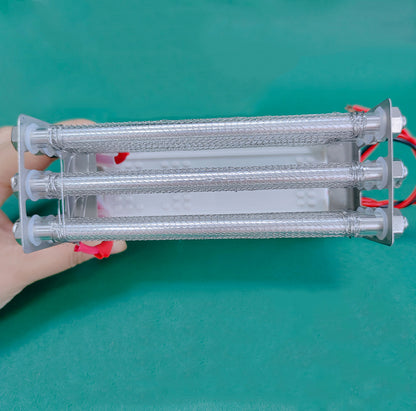 Top-down perspective studio shot of KINYO-CHINA KYOG220V27G 27g/h ozone generator held by hand demonstrating the compact 200mm tube length, stainless steel mesh outer sleeves, and robust structural assembly delivering 3.1kV to 3.5kV high-frequency pulse discharge at 16kHz for portable deodorization and commercial appliance integration.