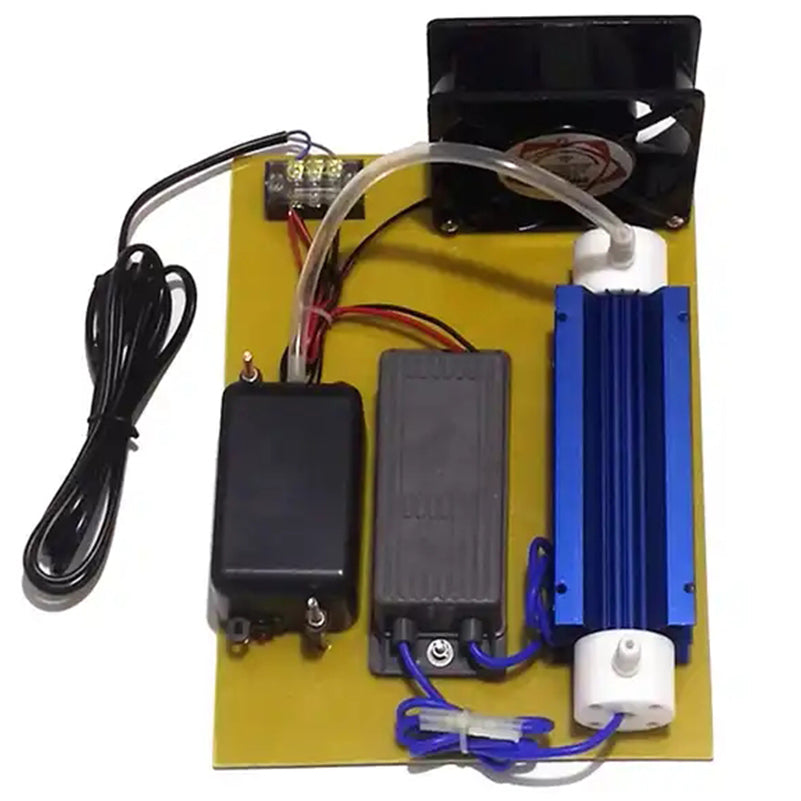 Top-down studio photograph of complete KINYO-CHINA KYOG-10GC OEM ozone generator assembly demonstrating the coordinated layout of cooling fan, power pack, diaphragm air pump, and blue ceramic discharge tube for equipment manufacturers.
